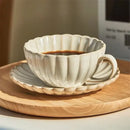 Cream scalloped ceramic afternoon tea cup and saucer dining room set by Decorbites