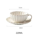 Cream scalloped ceramic afternoon tea cup and saucer dining room set by Decorbites