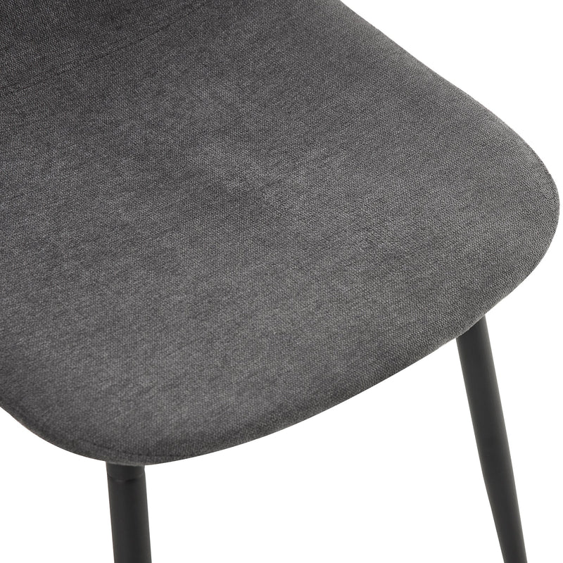 A modern and practical circular dining table. Made of MDF tabletop and wooden MDF table legs. A set of 4 cushioned chairs.