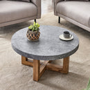 A modern retro circular coffee table with a diameter of 31.4 inches, made of MDF material, suitable for living rooms