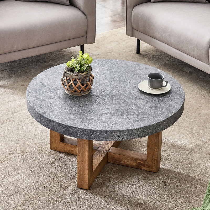 A modern retro circular coffee table with a diameter of 31.4 inches, made of MDF material, suitable for living rooms