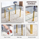 A modern minimalist style glass dining table. Transparent tempered glass tabletop with a thickness of 0.3 feet and golden metal legs. Suitable for restaurants and living rooms. 51"x31.4"x29.5"