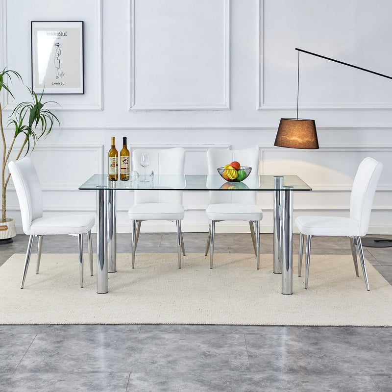 A modern minimalist style glass dining table. Transparent tempered glass tabletop with a thickness of 0.3 feet and silver metal legs. Suitable for restaurants and living rooms. 63 "x 35.4" x 30"