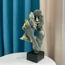 Abstract bronze & gold art couple mask statue – living room decor by Decorbites