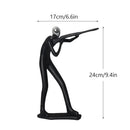 Abstract athlete statue sculpture – black & silver office decor by Decorbites