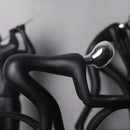 Abstract athlete statue sculpture – black & silver office decor by Decorbites