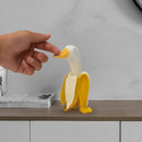 Whimsical white & yellow abstract banana duck sculpture living room decor by Decorbites