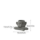 Abstract gray ceramic face flowerpot ornament living room planter by Decorbites