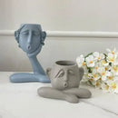 Abstract gray ceramic face flowerpot ornament living room planter by Decorbites
