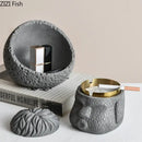 Abstract figure portraits cement ashtray black & gold living room decor by Decorbites