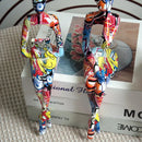 Modern pop art abstract figurine – living room graffiti decor by Decorbites