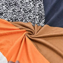 Geometric orange & black accent chair cover – living room slipcover by Decorbites