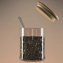 Striped glass coffee bean storage jar with bamboo lid for kitchen by Decorbites