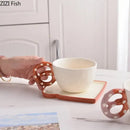 Polka dot pretzel biscuit mug and saucer set dining room ceramic cup by Decorbites