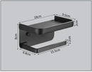 Matte black aluminum tissue holder with phone shelf bathroom rack by Decorbites