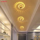 Blue aluminum spiral led wall lamp for bedroom circular light patterns by Decorbites