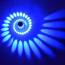 Blue aluminum spiral led wall lamp for bedroom circular light patterns by Decorbites
