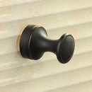 Antique brass robe hook with floral engraving and rope bathroom hook by Decorbites