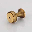 Antique brass robe hook with floral engraving and rope bathroom hook by Decorbites