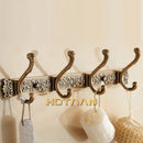 Antique brass robe hook ornate wall mount bathroom towel holder by Decorbites