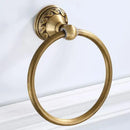 Antique brass round towel ring with ornate leaf mount for bathroom by Decorbites