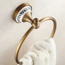 Antique bronze floral ceramic towel ring – bathroom wall holder by Decorbites