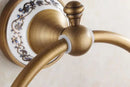 Antique bronze floral ceramic towel ring – bathroom wall holder by Decorbites