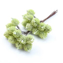 Fuzzy light green artificial spruce branches living room decor by Decorbites