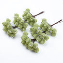 Fuzzy light green artificial spruce branches living room decor by Decorbites