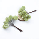 Fuzzy light green artificial spruce branches living room decor by Decorbites