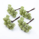 Fuzzy light green artificial spruce branches living room decor by Decorbites