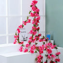 Pink artificial sakura flowers vine garden and wedding decor by Decorbites