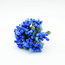 Vibrant assorted artificial stamen flowers for living room decor by Decorbites