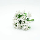 Vibrant assorted artificial stamen flowers for living room decor by Decorbites