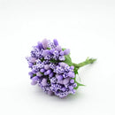 Vibrant assorted artificial stamen flowers for living room decor by Decorbites