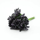 Vibrant assorted artificial stamen flowers for living room decor by Decorbites