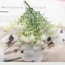 Pastel pink and lavender artificial succulent tree living room decor by Decorbites