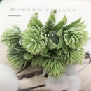 Pastel pink and lavender artificial succulent tree living room decor by Decorbites