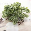 Pastel pink and lavender artificial succulent tree living room decor by Decorbites