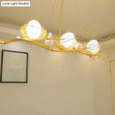 GobekUsa Artistic 3-Light Beige Nest and Egg Island Pendant with Cream Glass Shade
