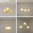 GobekUsa Artistic 3-Light Beige Nest and Egg Island Pendant with Cream Glass Shade