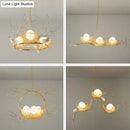 GobekUsa Artistic 3-Light Beige Nest and Egg Island Pendant with Cream Glass Shade