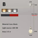 Modern white and gold astronaut lunar pendant light bedroom decor by Decorbites