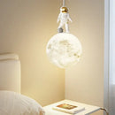 Modern white and gold astronaut lunar pendant light bedroom decor by Decorbites