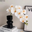 Modern purple & blue orchid artificial flowers in black glass vase living room decor by Decorbites