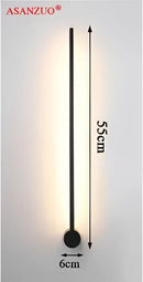 Modern black & gold aluminum wall sconce for bedroom lighting by Decorbites