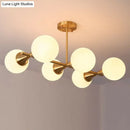 GobekUsa Brass Finish 6-Light Postmodern Linear Island Pendant with Glass Ball Shade