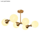 GobekUsa Brass Finish 6-Light Postmodern Linear Island Pendant with Glass Ball Shade