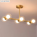 GobekUsa Brass Finish 6-Light Postmodern Linear Island Pendant with Glass Ball Shade