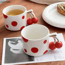 Red polka dot porcelain coffee mug with cherry handle kitchen decor by Decorbites